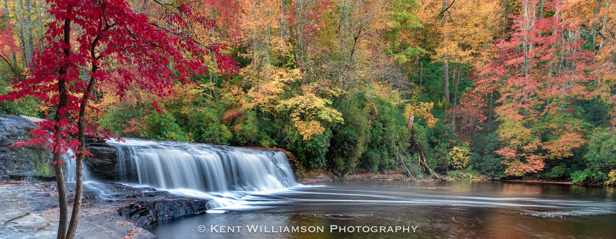 Emerging Fall color along Little River at Hooker Falls in DuPont State Forest, North Carolina.  Fall 2022