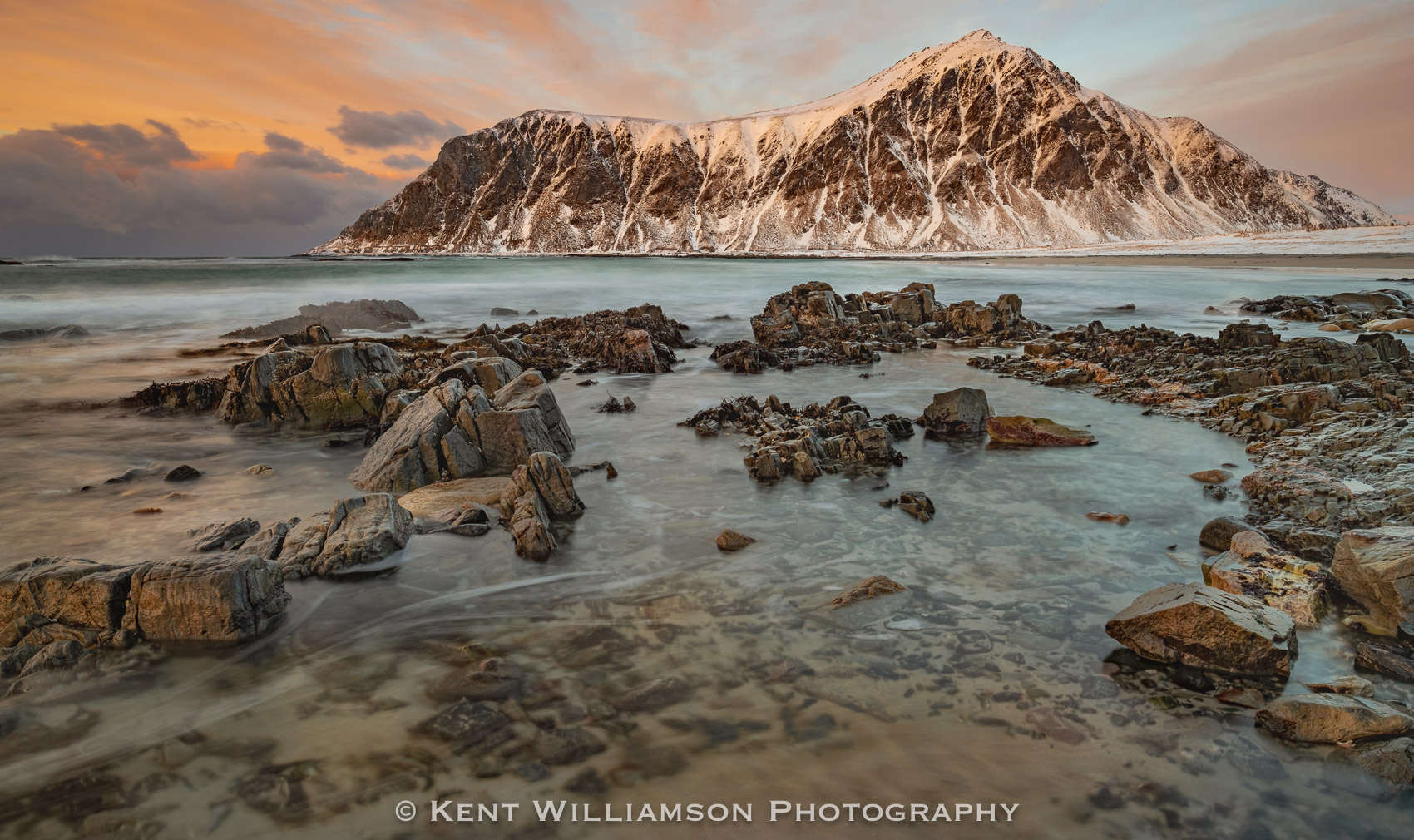 Low sun around Hustinden Mountain in Lofoten, Norway.